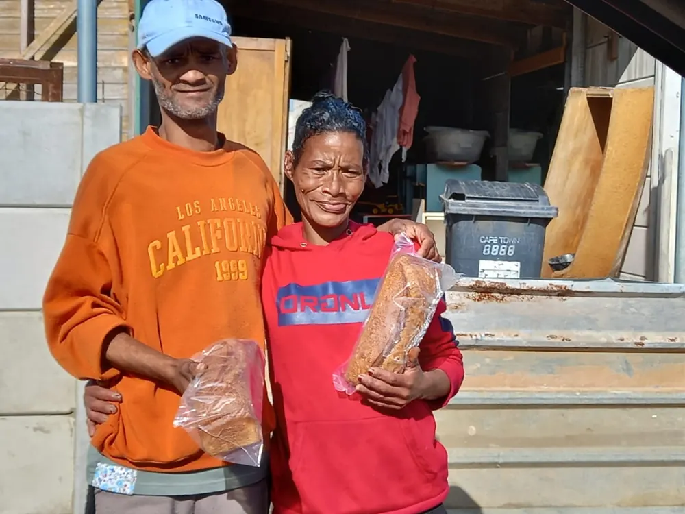 Community members in Darling with bread