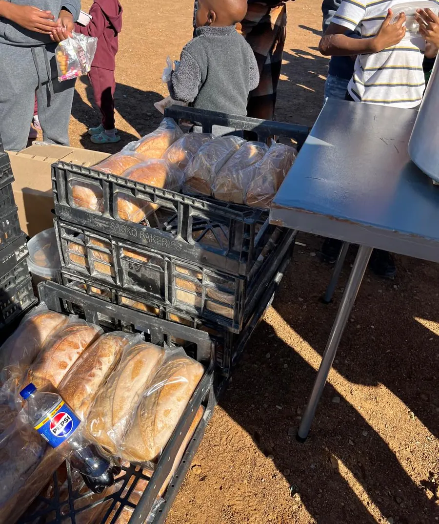 Community members in Darling with bread