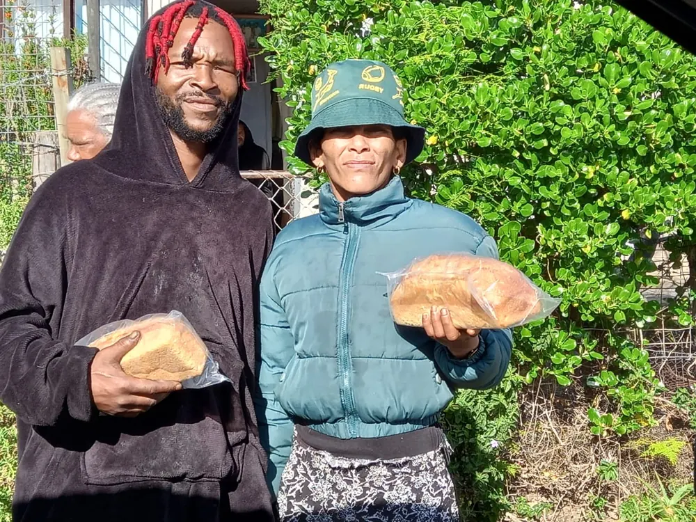 Community members in Darling with bread