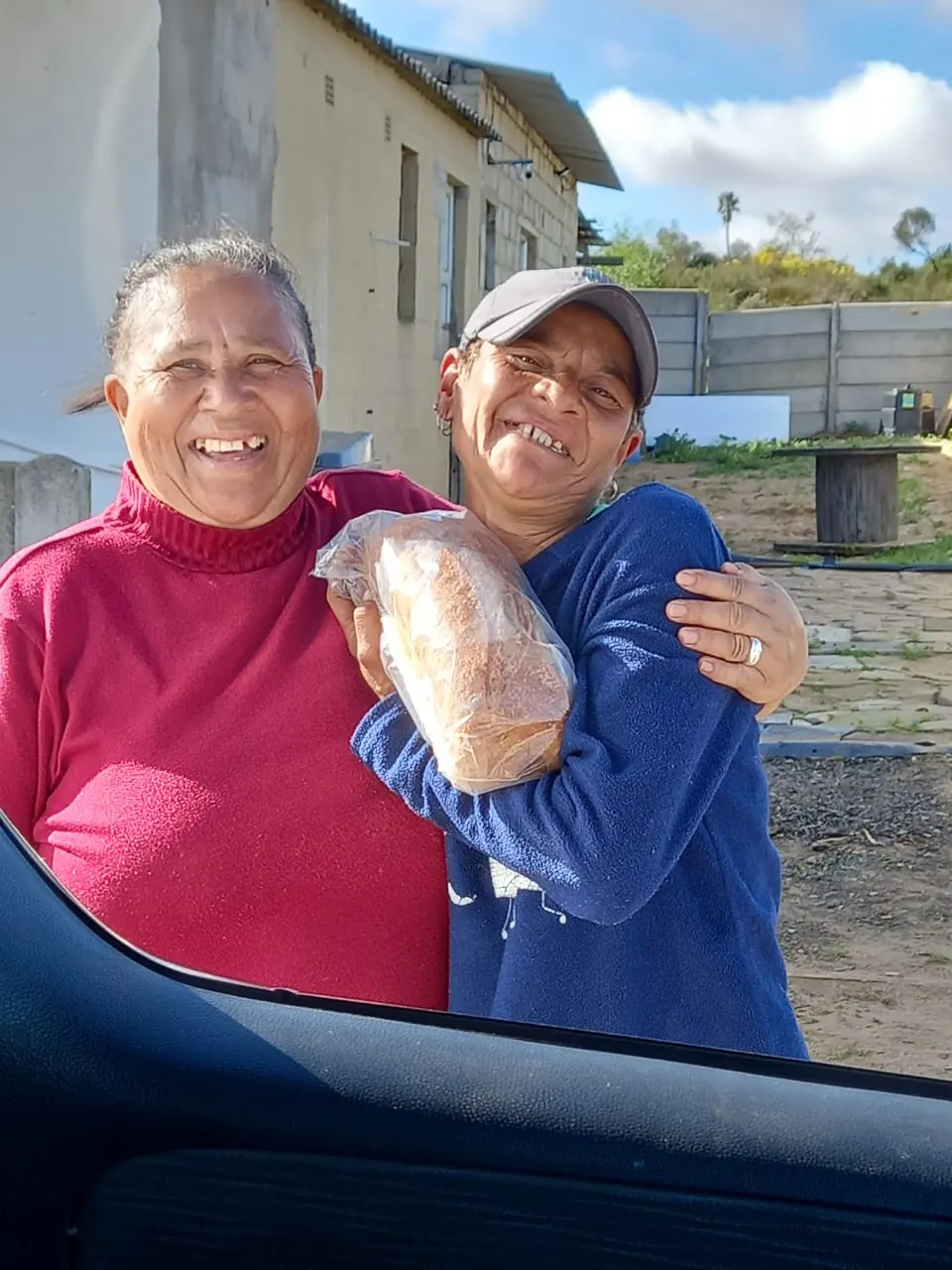Community members in Darling with bread